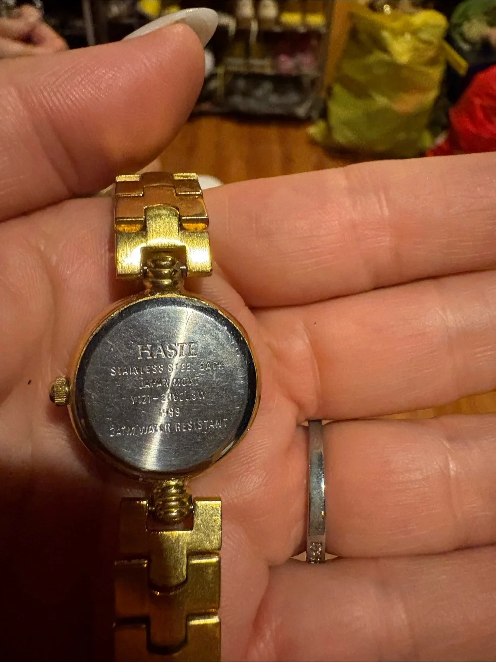 Haste Gold Tone Wrap Watch with Red Accent